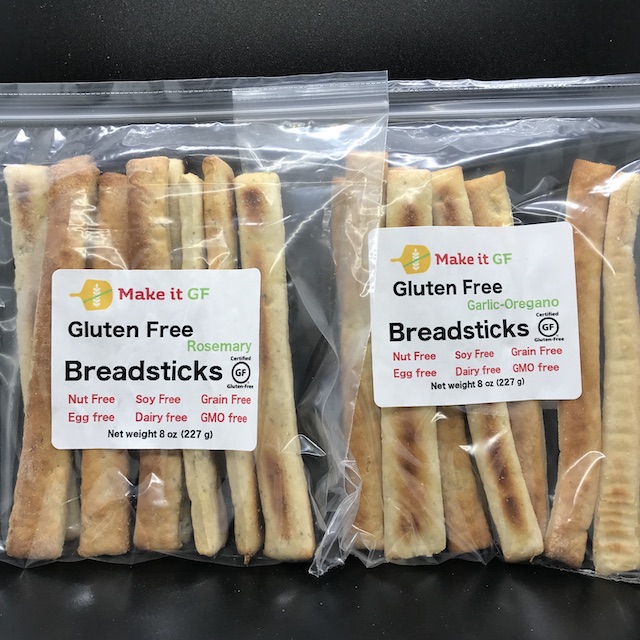 Image of rosemary breadsticks and garlic oregano breadsticks in retail packaging