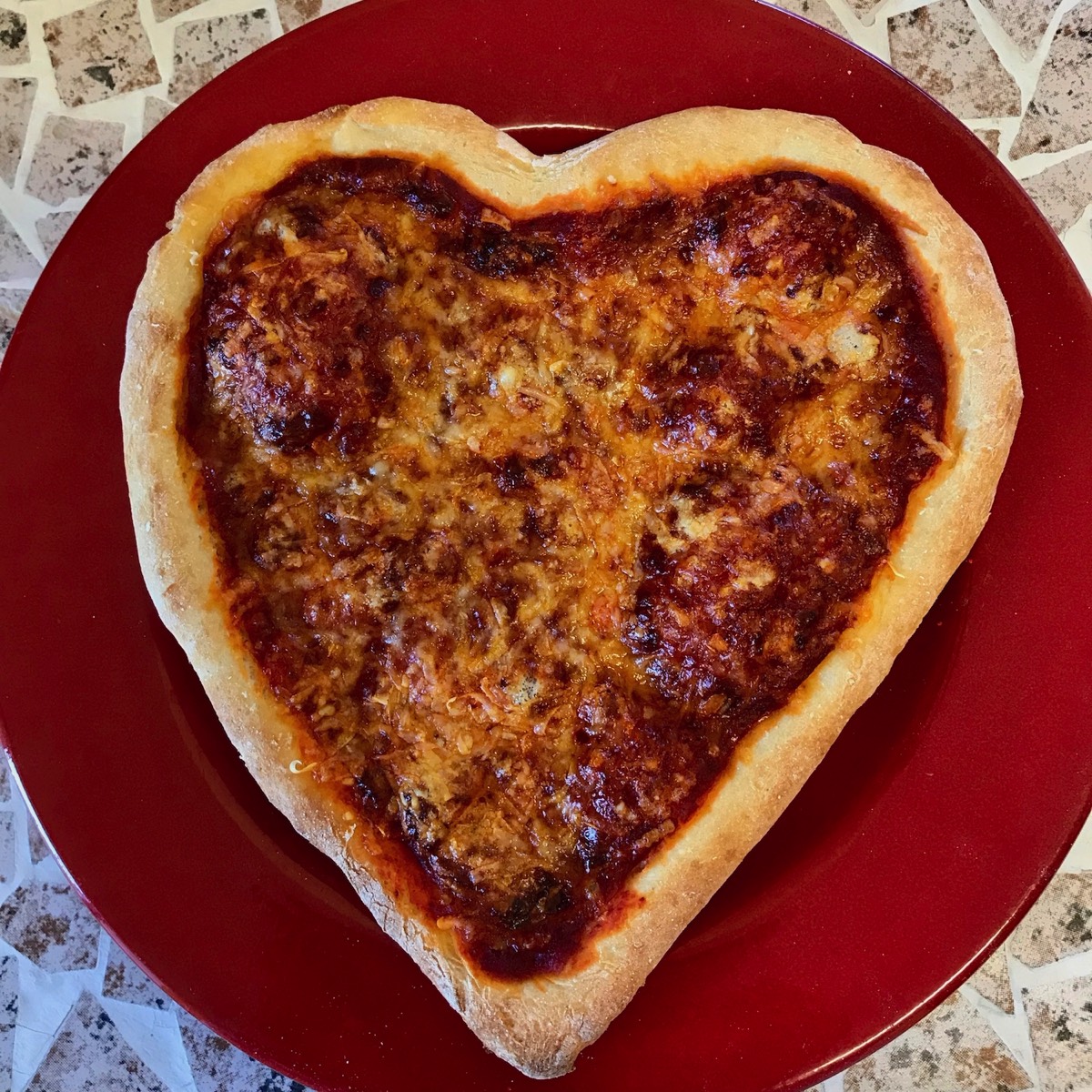 Image of heart shaped pizza